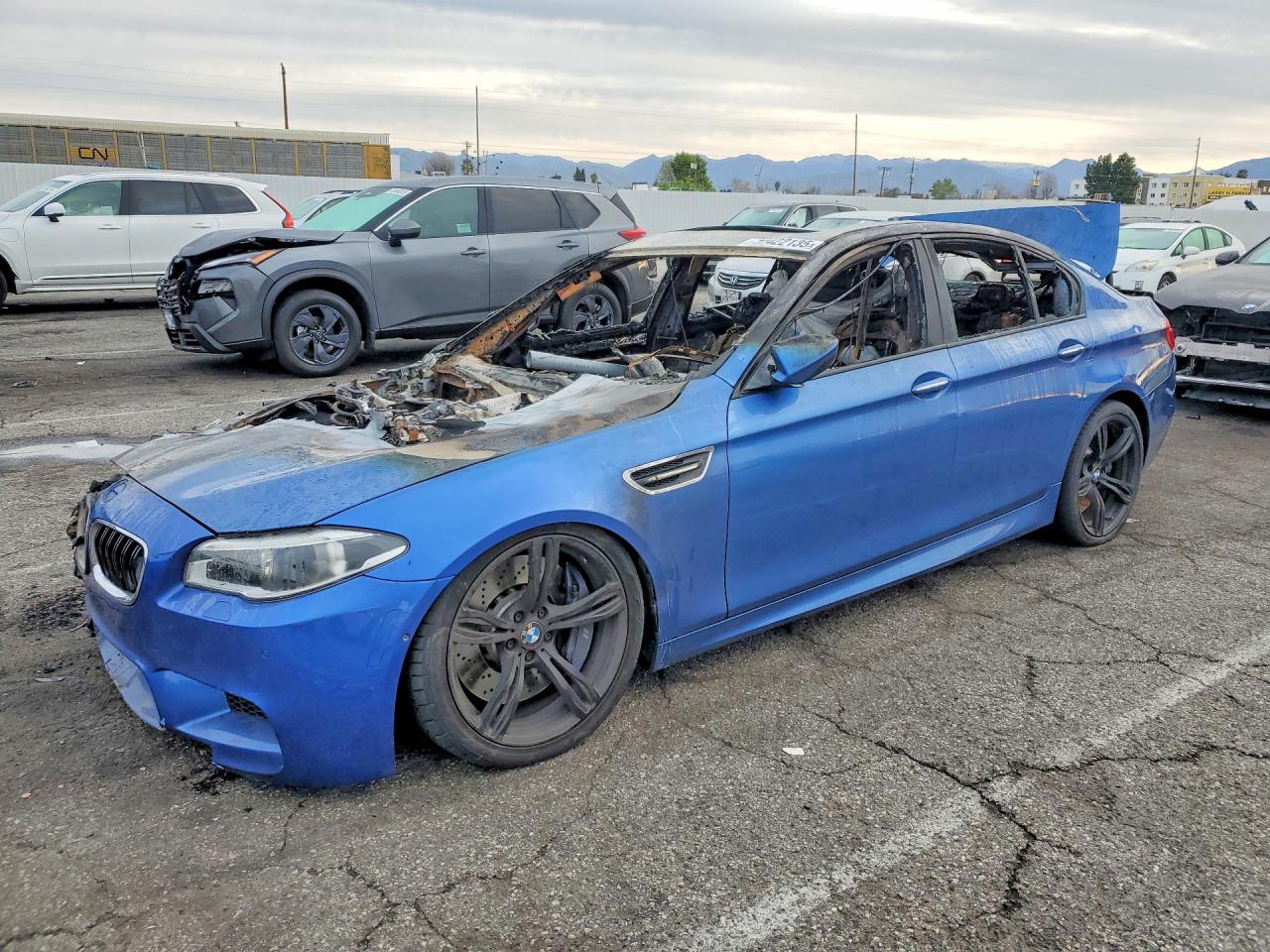 2014 BMW M5, VIN WBSFV9C53ED593952 — Пожар