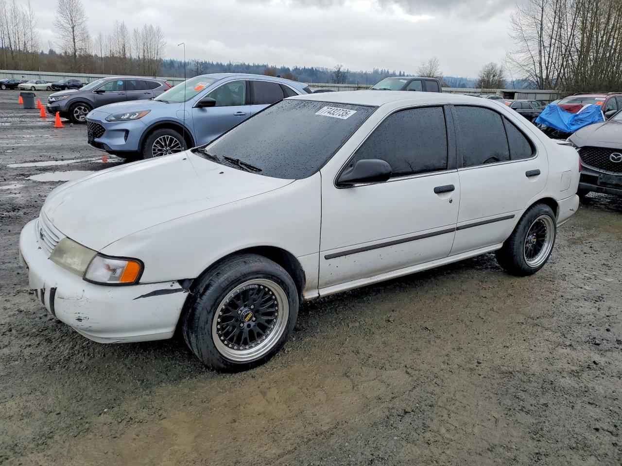 1997 Nissan Sentra XE, VIN 3N1AB41D3VL028816 — Зад