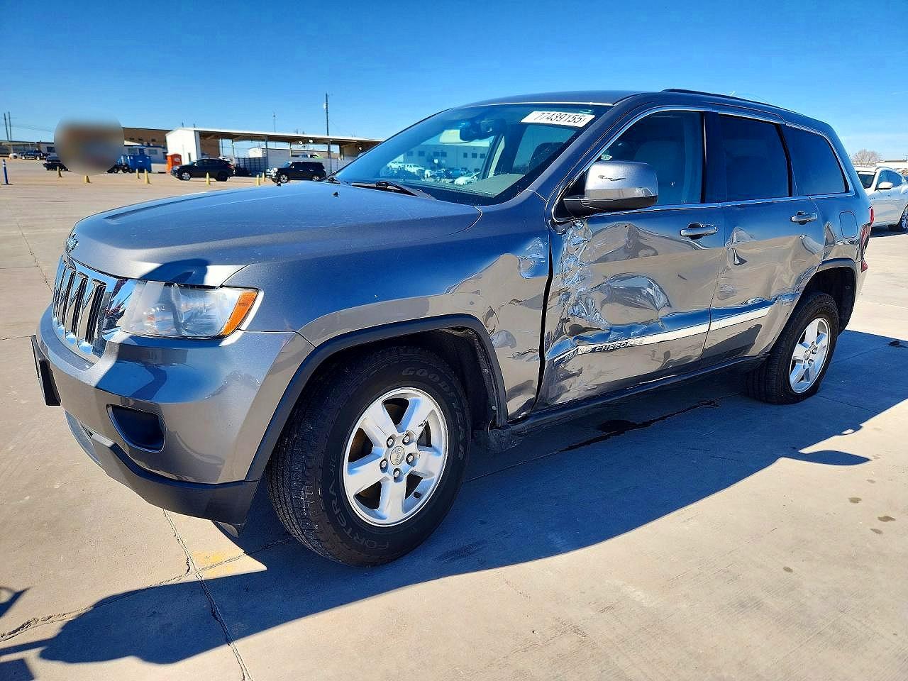 2013 Jeep Grand Cherokee Laredo, VIN 1C4RJFAG9DC582557 — Side