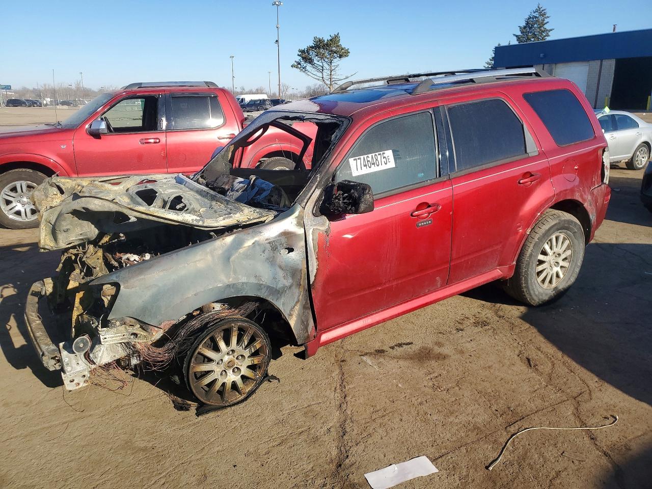 2009 Mercury Mariner Premier, VIN 4M2CU87789KJ04721 — Burn