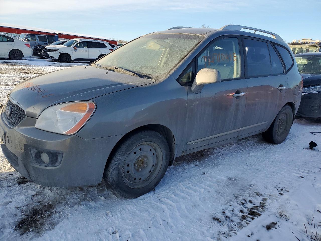 2012 Kia Rondo, VIN KNAHH8A87C7412830 — Side