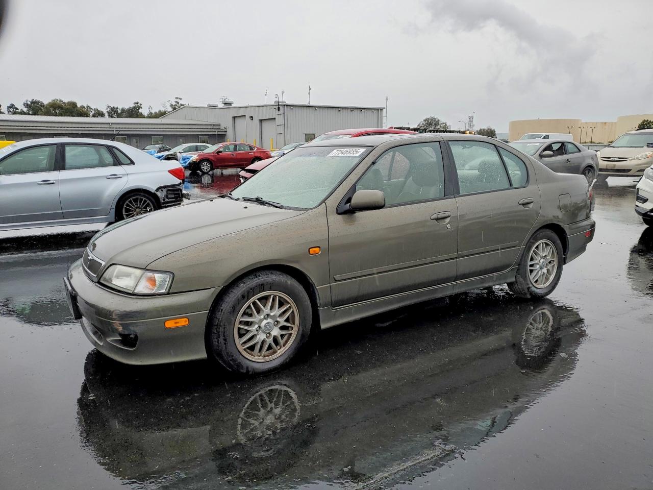 1999 Infiniti G20, VIN JNKCP11A8XT019344 — Rear end