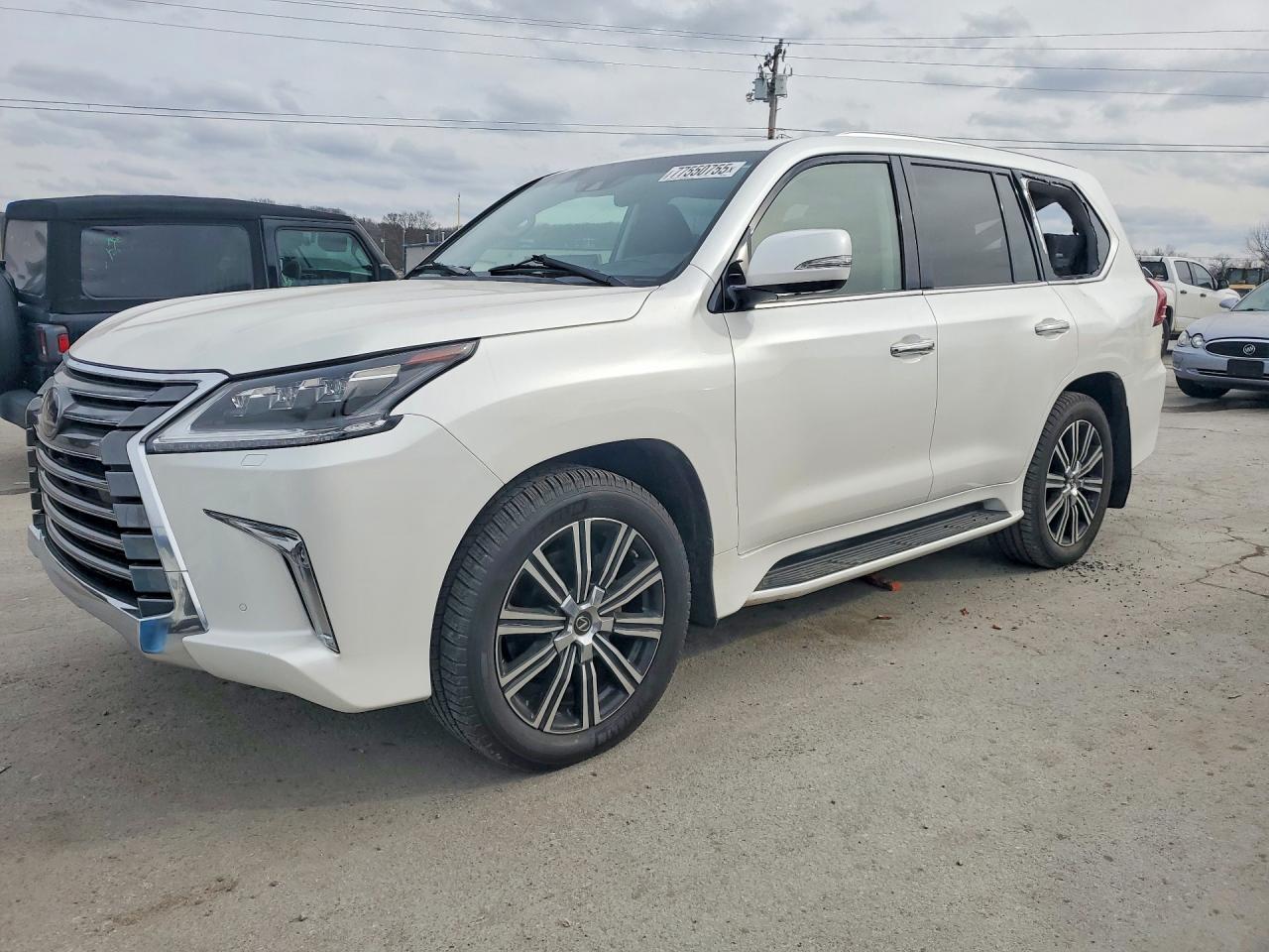 2019 Lexus LX 570, VIN JTJHY7AX6K4309920 — Зад