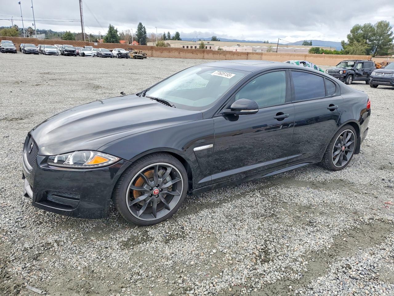 2015 Jaguar XF Portfolio, VIN SAJWA0F71F8U62350 — Undercarriage