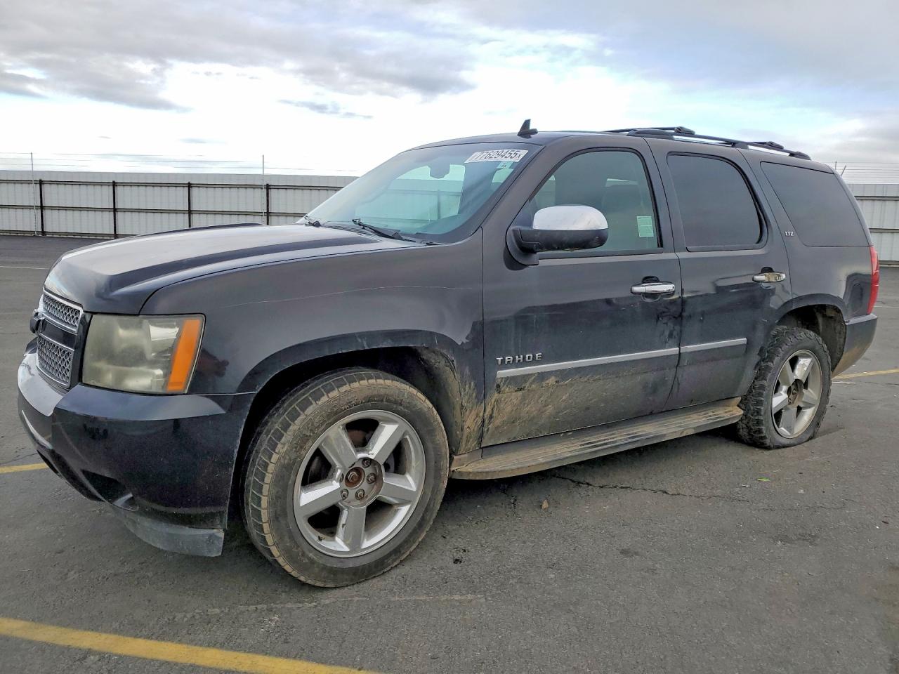 2011 Chevrolet Tahoe LTZ, VIN 1GNSKCE06BR283460 — Вандализм