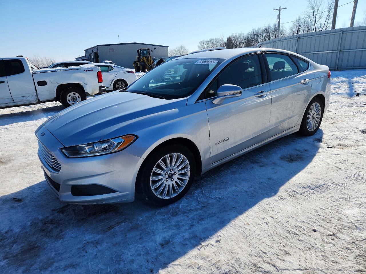 2016 Ford Fusion SE Hybrid, VIN 3FA6P0LU4GR250779 — Side