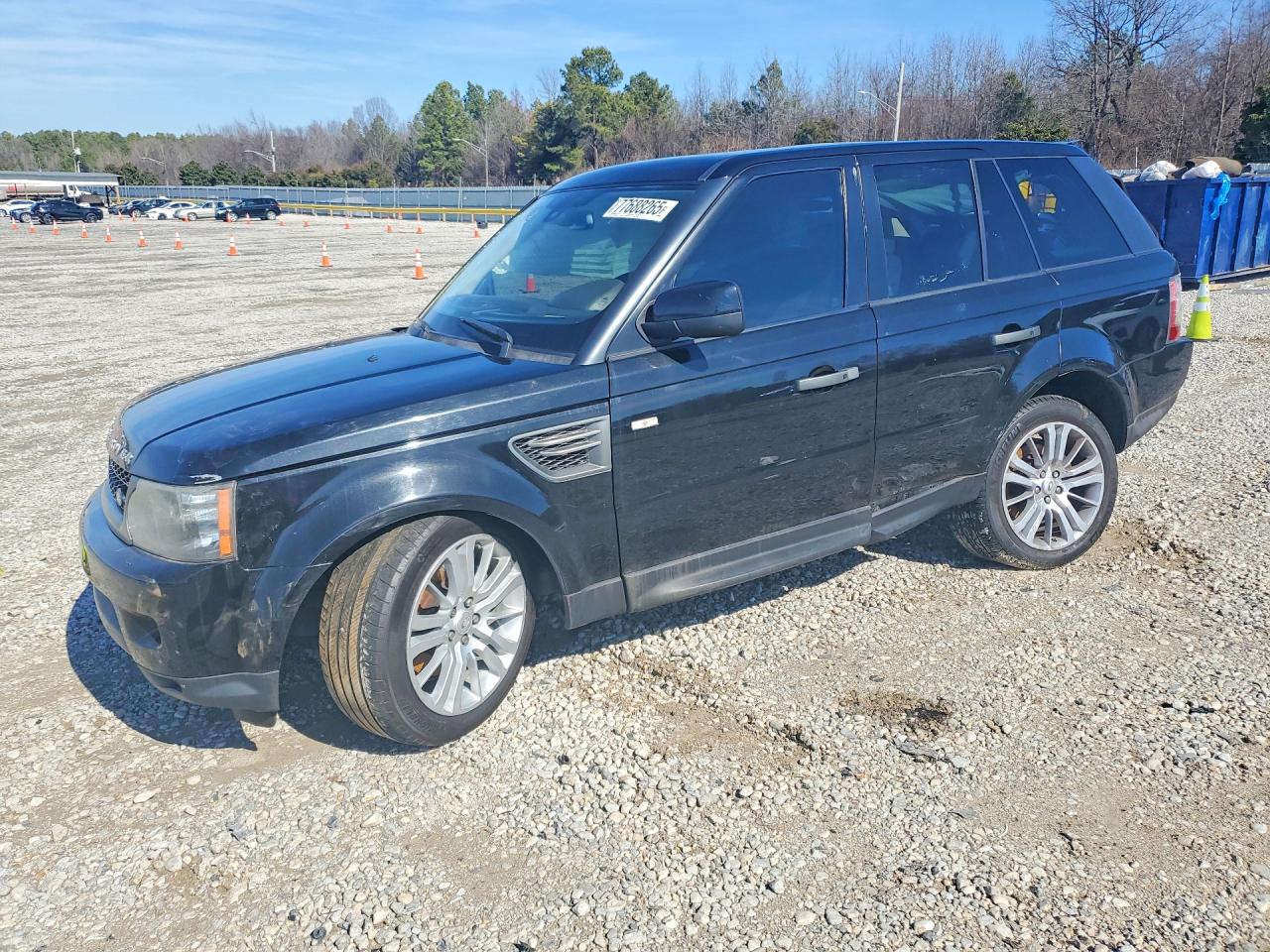 2011 Land Rover Range Rover Sport HSE Lux, VIN SALSK2D41BA272803 — Side