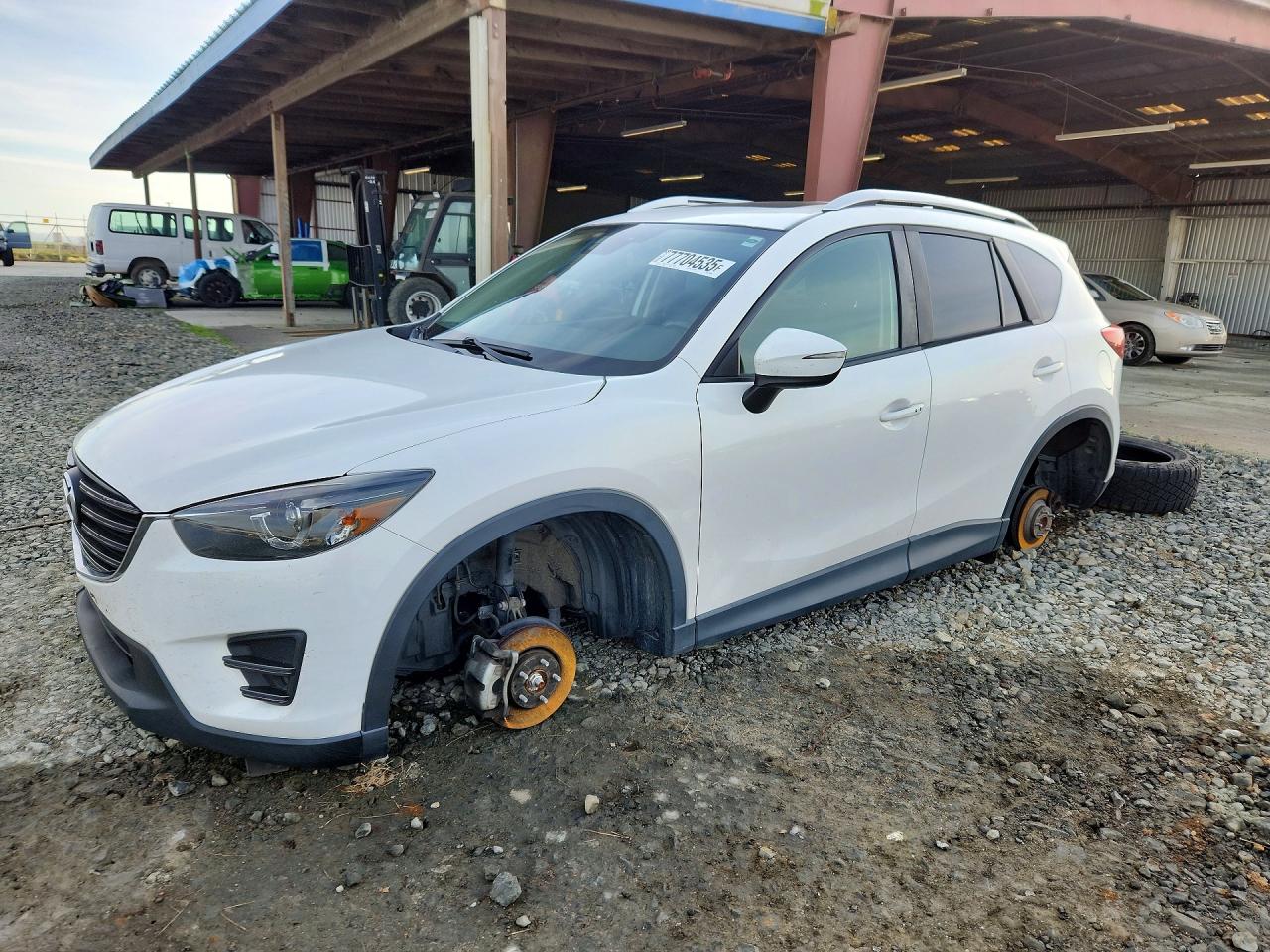 2016 Mazda CX-5 Grand Touring, VIN JM3KE2DY2G0920056 — Stripped