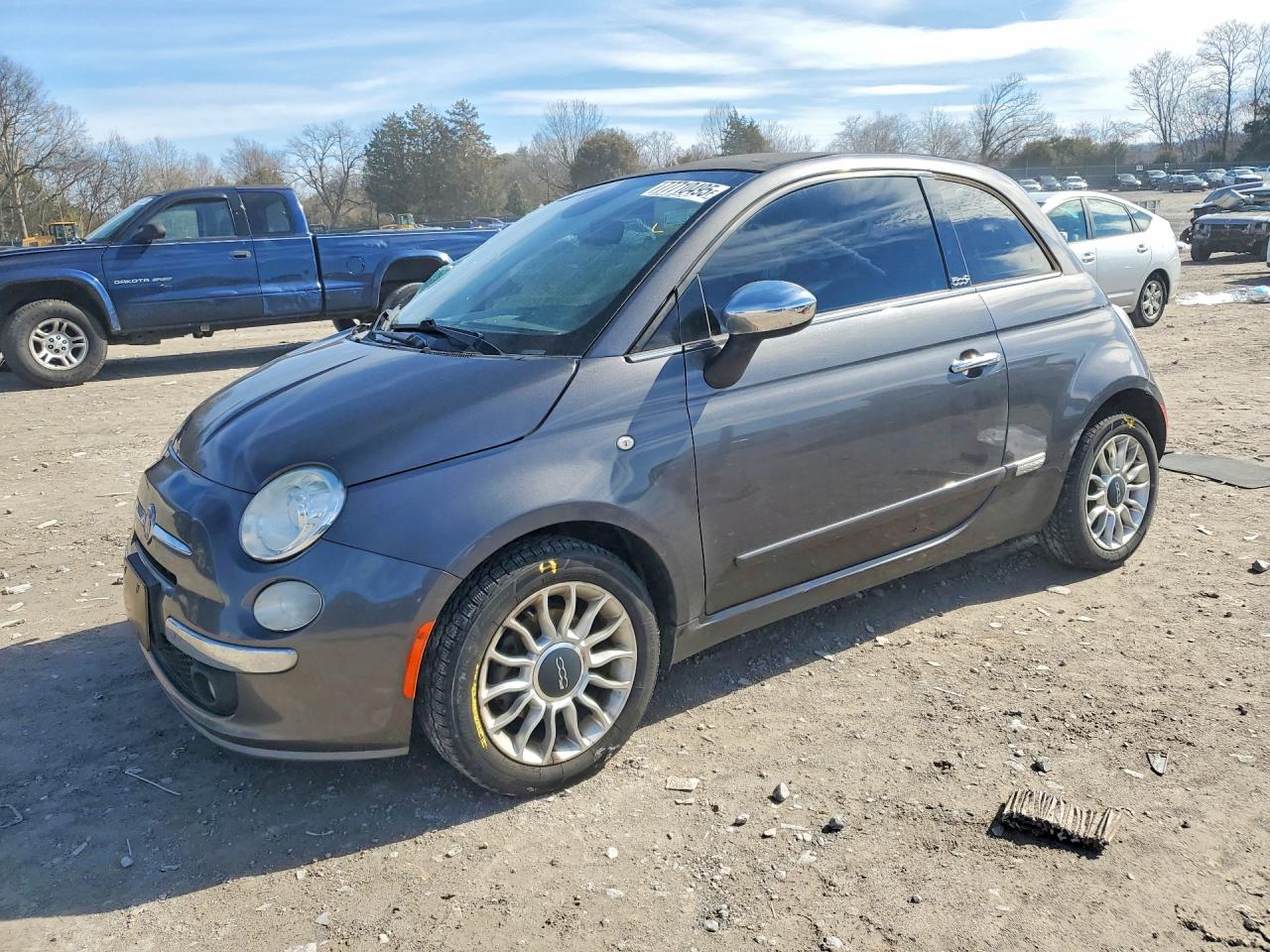 2014 FIAT 500 Lounge, VIN 3C3CFFER0ET249225 — Side