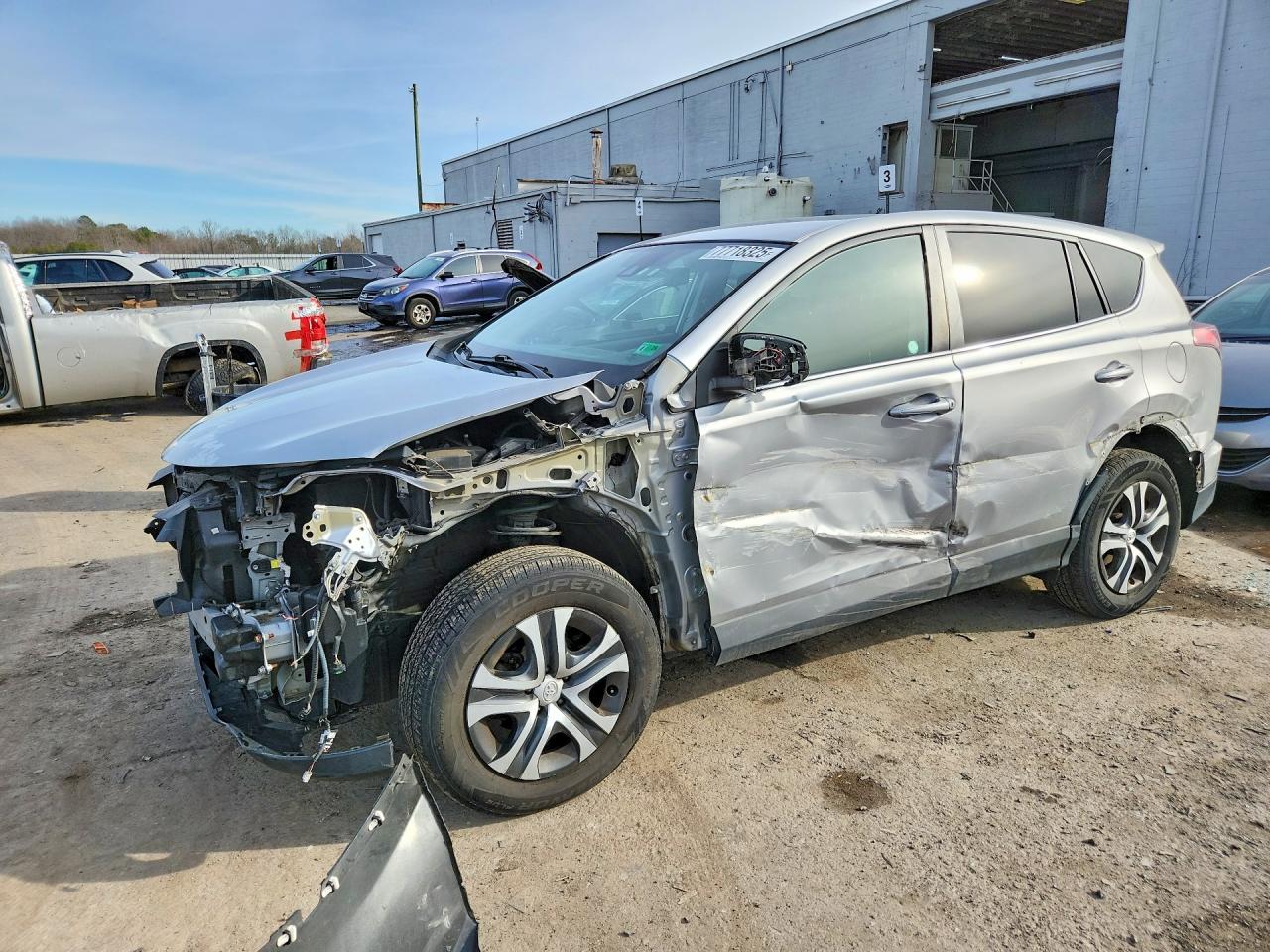2018 Toyota RAV4 LE, VIN 2T3BFREV4JW714677 — Front end