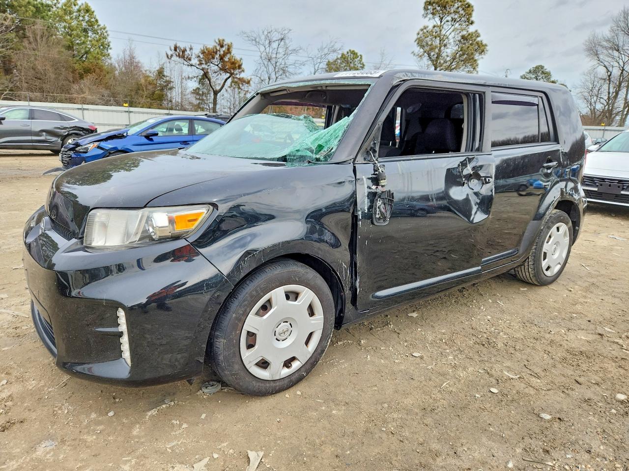 2013 Scion xB, VIN JTLZE4FE0DJ039243 — Бок
