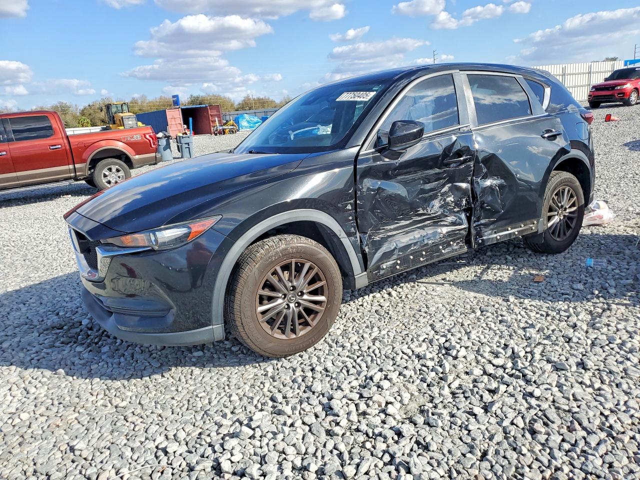 2020 Mazda CX-5 Sport, VIN JM3KFABM5L0723383 — Side