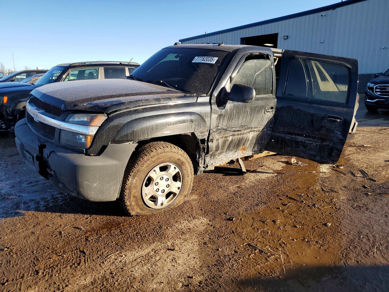 2005 Chevrolet Avalanche Z71, VIN 3GNEK12ZX5G182818 — Side