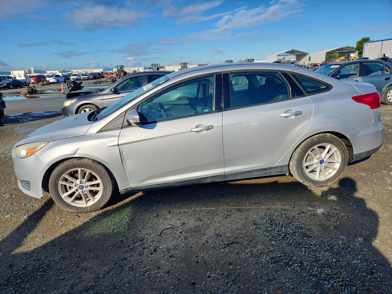 2016 Ford Focus SE, VIN 1FADP3F24GL348504 — Minor dents and scratches