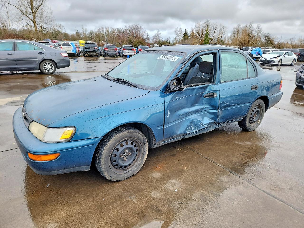 1994 Toyota Corolla, VIN 1NXAE04B1RZ158916 — Side