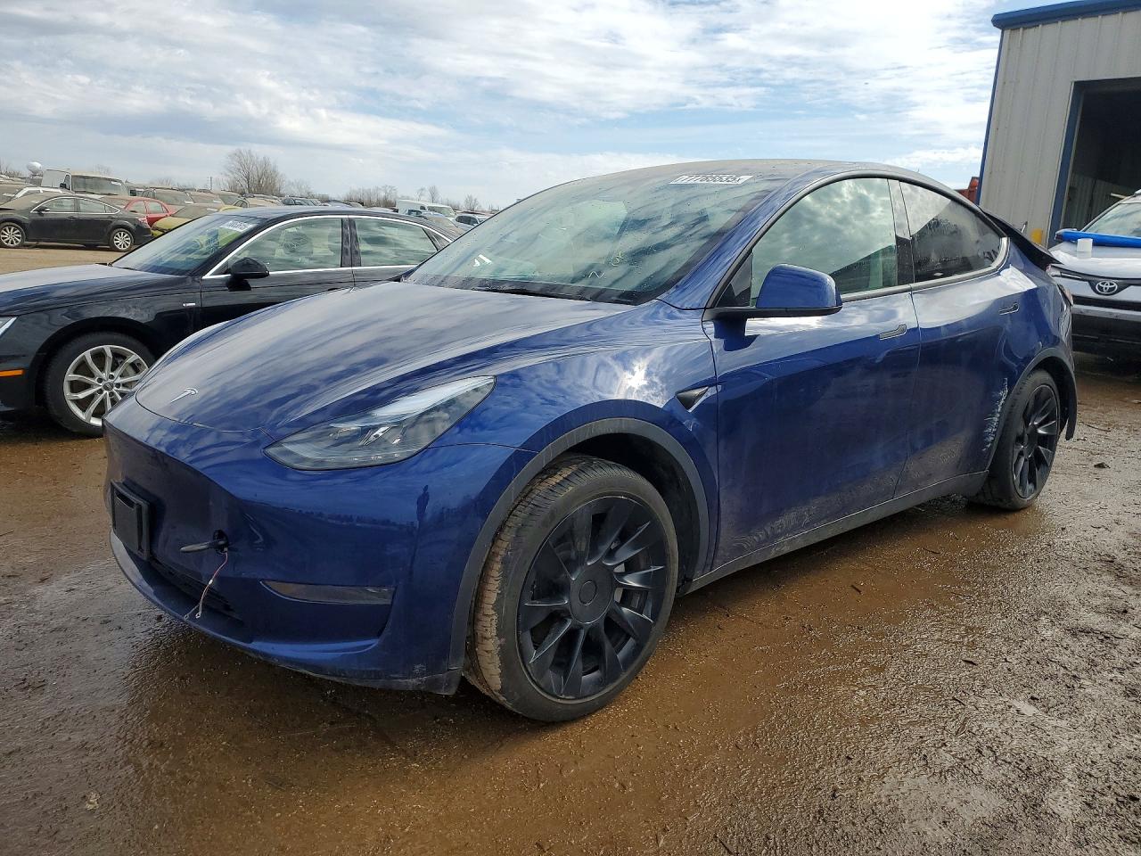 2024 Tesla Model Y, VIN 7SAYGDED6RF038593 — Rear end