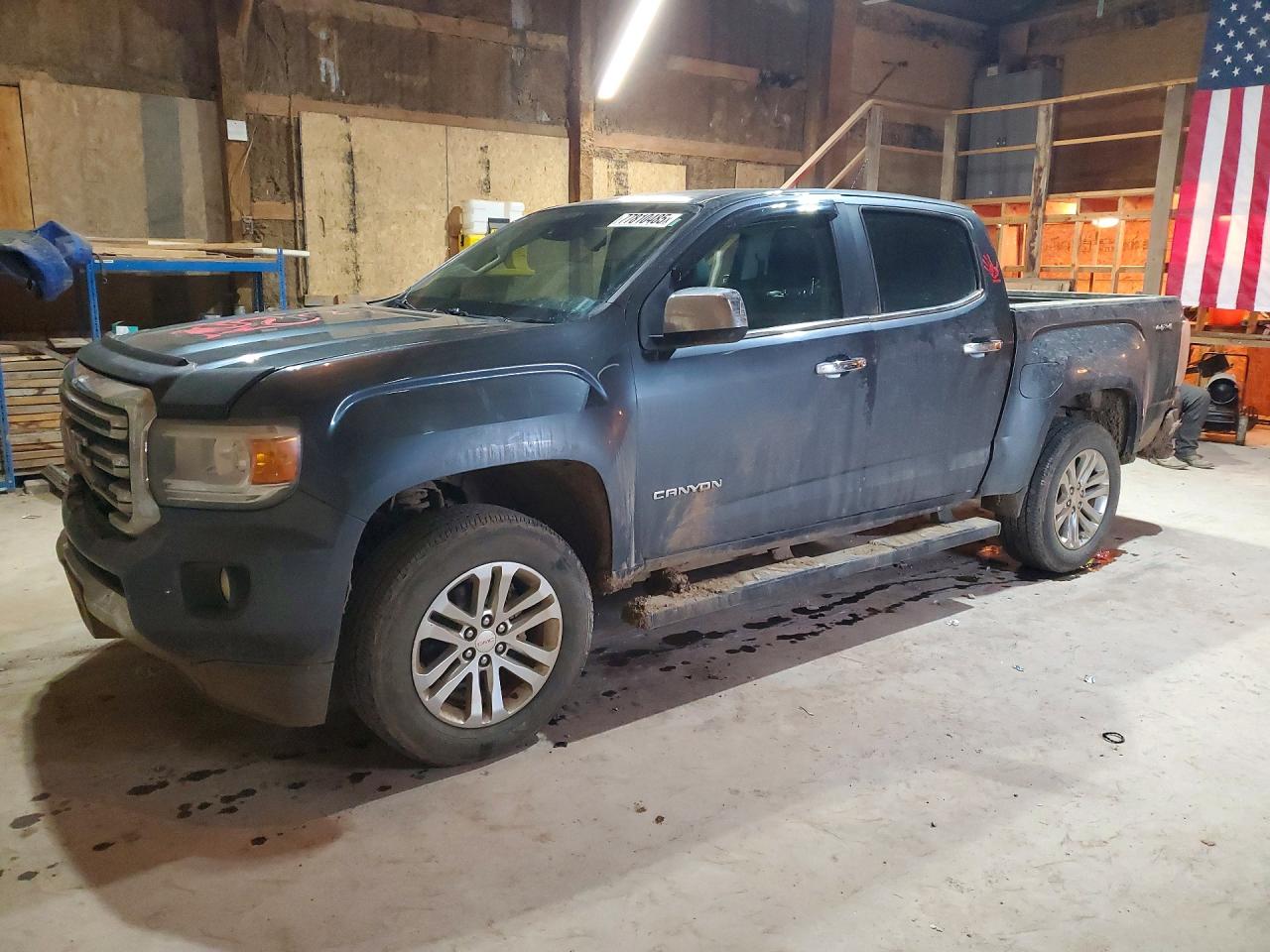 2015 GMC Canyon 4WD SLT, VIN 1GTG6CE35F1168303 — Side