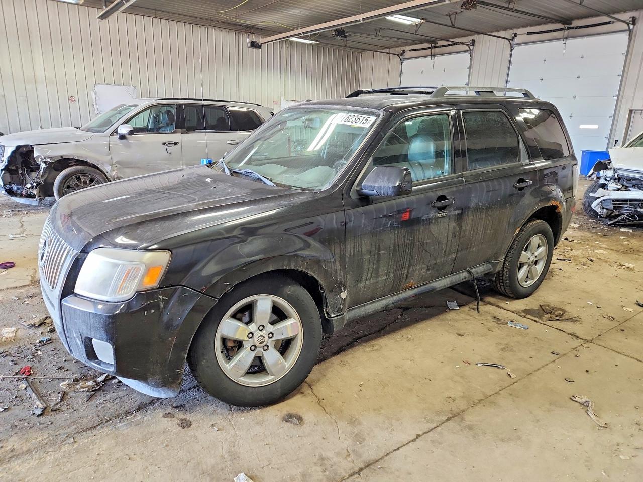 2011 Mercury Mariner Premier, VIN 4M2CN8HG0BKJ02298 — Normal wear