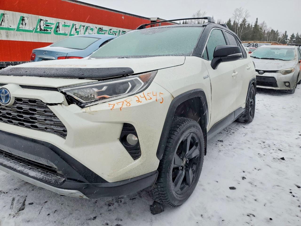 2021 Toyota RAV4 Hybrid XLE, VIN 2T3RWRFV4MW113142 — Зад