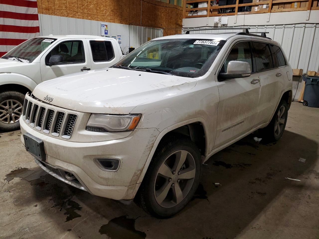 2015 Jeep Grand Cherokee Overland, VIN 1C4RJFCT0FC687565 — Зад