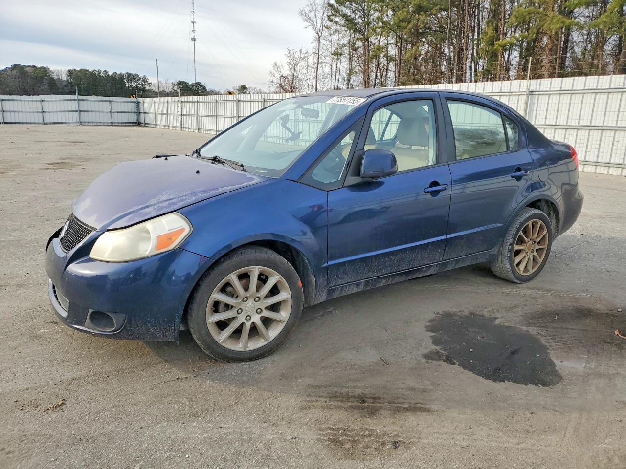 2011 Suzuki SX4 LE, VIN JS2YC5A23B6300113 — Front end
