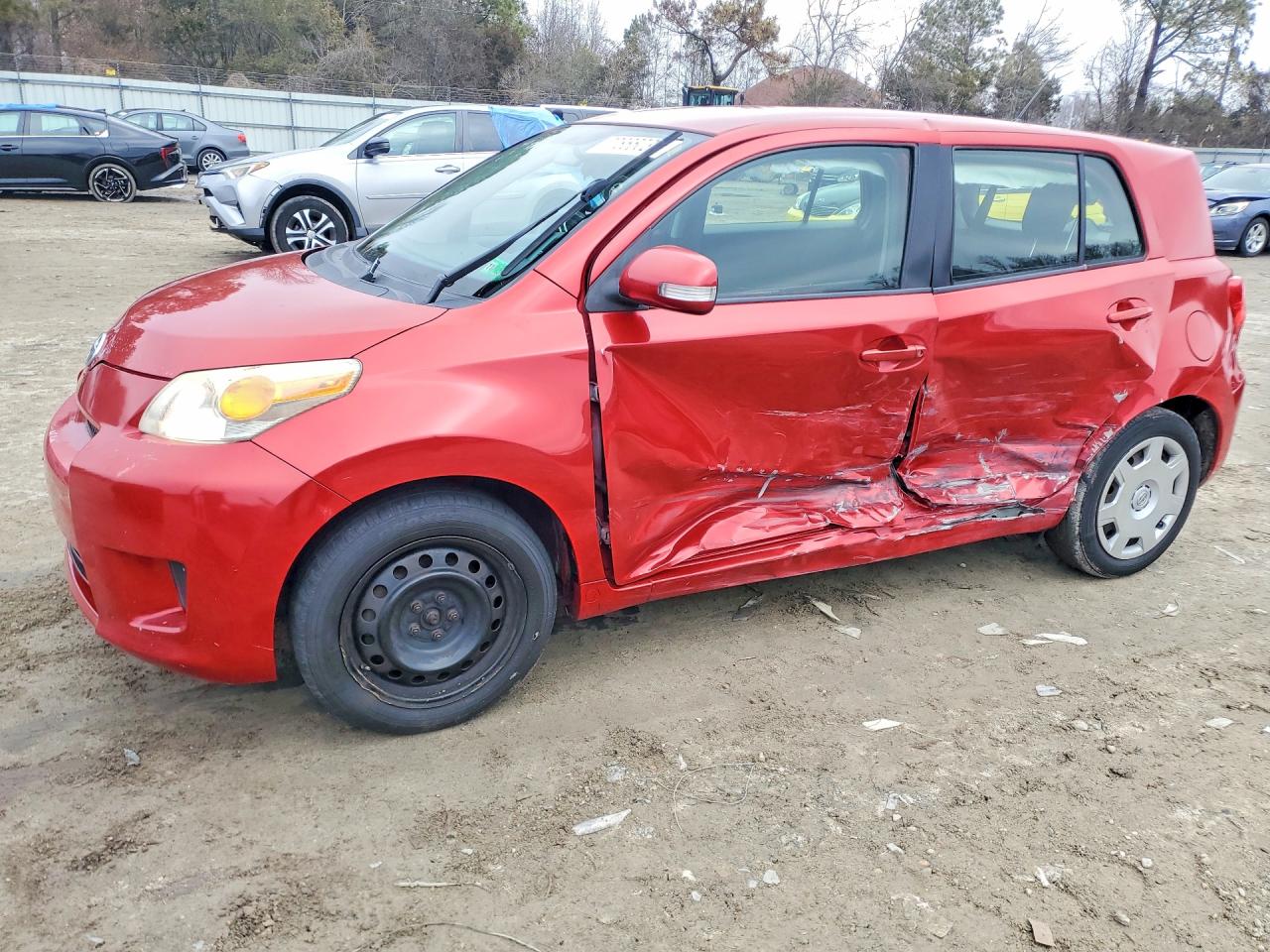 2010 Scion xD, VIN JTKKU4B42A1001210 — Бок