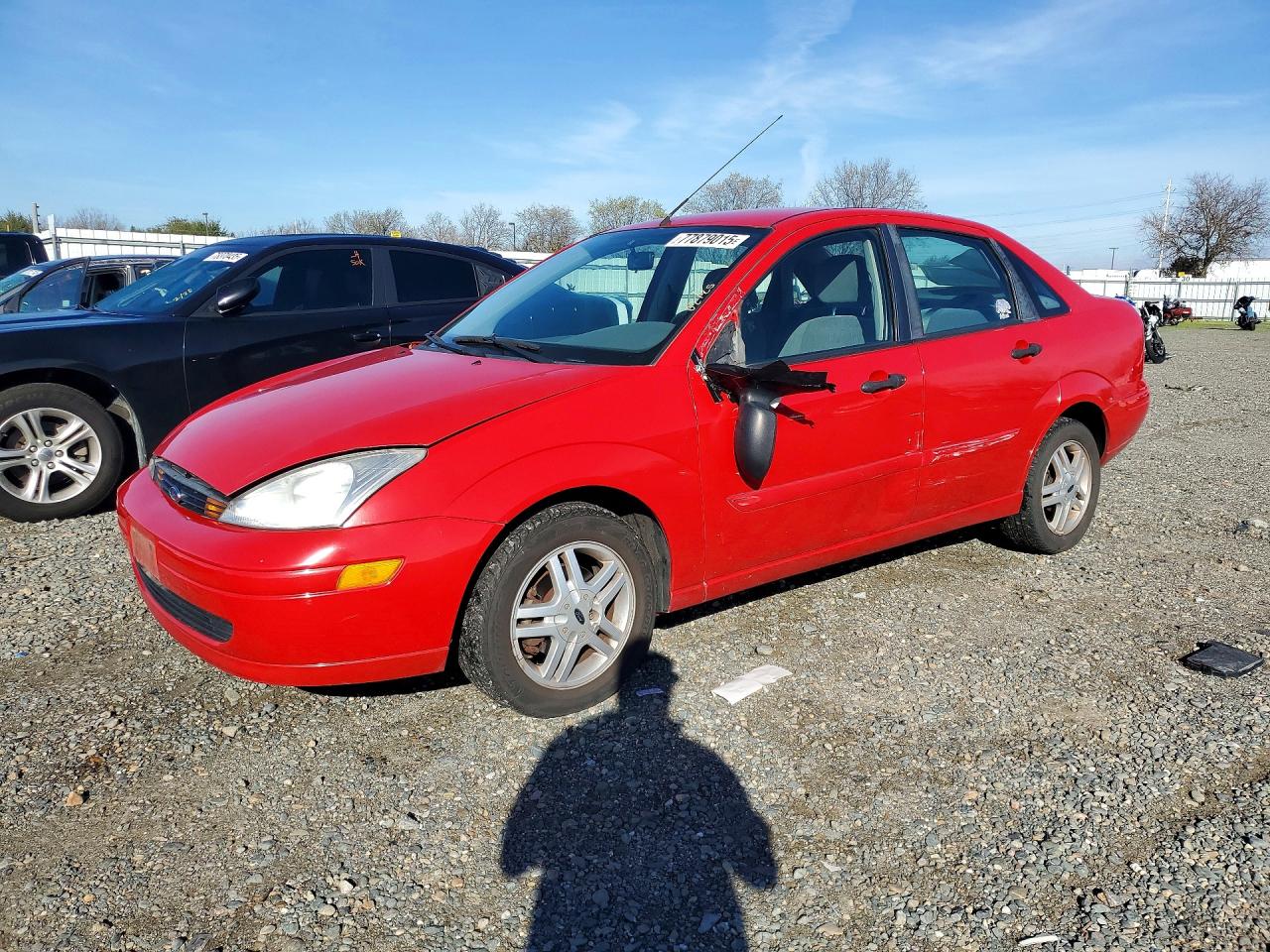 2000 Ford Focus SE, VIN 1FAFP34P3YW214753 — Бок