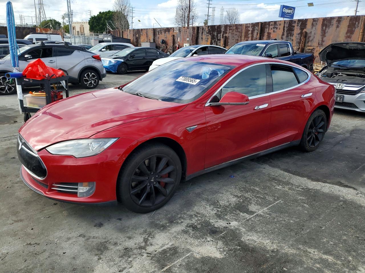 2014 Tesla Model S 60, VIN 5YJSA1H10EFP30508 — Vandalism