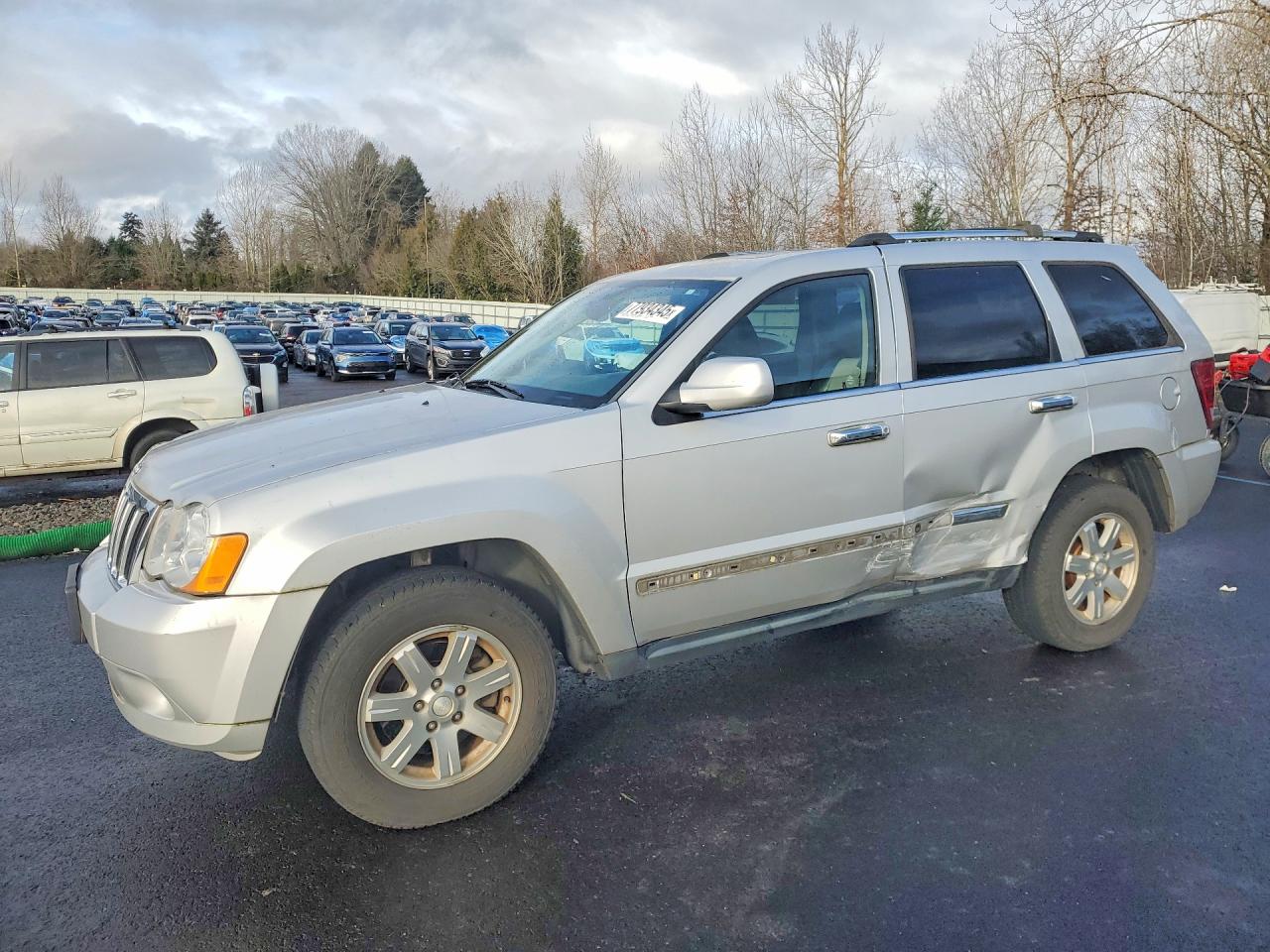 2010 Jeep Grand Cherokee Limited, VIN 1J4PR5GKXAC162723 — Side