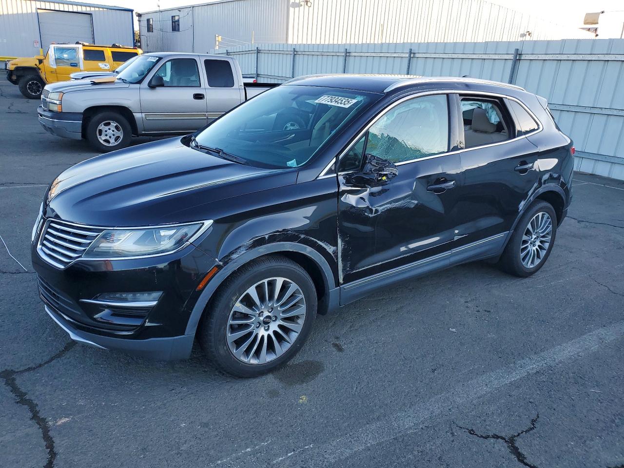 2017 Lincoln MKC Reserve, VIN 5LMCJ3C91HUL07499 — Side