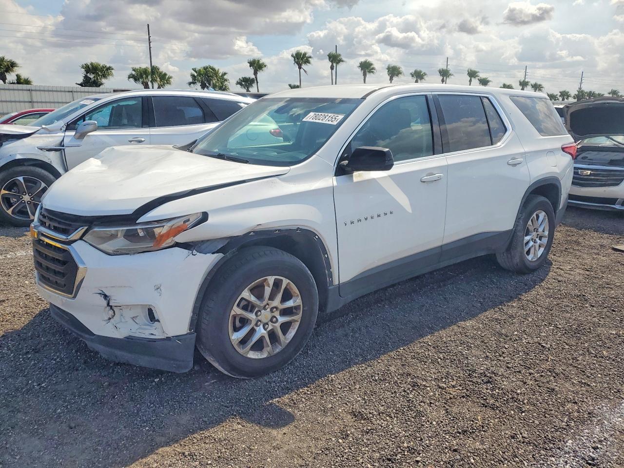 2018 Chevrolet Traverse LS, VIN 1GNERFKW4JJ107636 — Front end