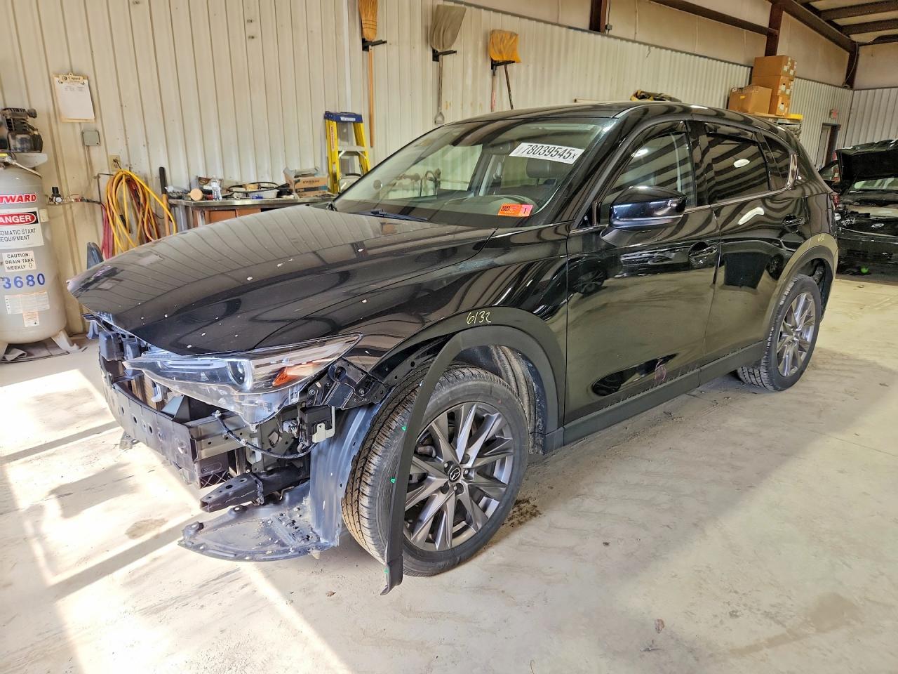 2021 Mazda CX-5 Grand Touring, VIN JM3KFBDM1M0431721 — Front end