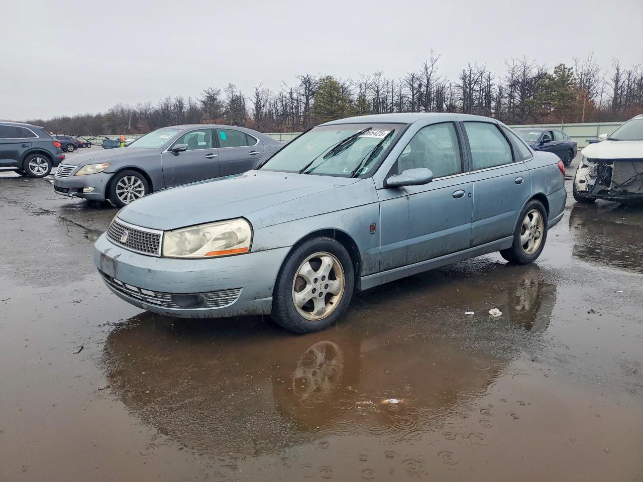 2004 Saturn L L300 2, VIN 1G8JD54R34Y507085 — Side