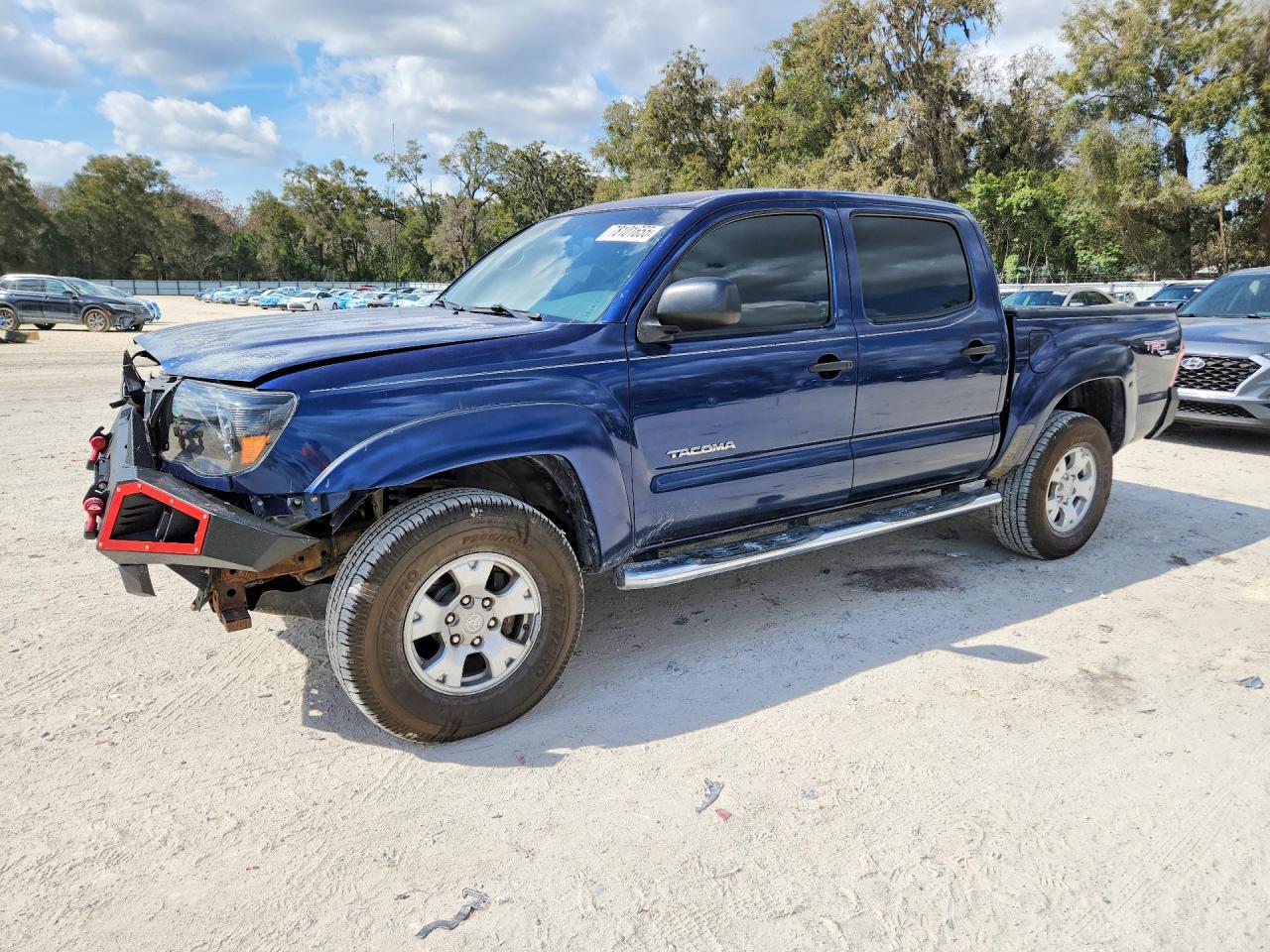 2005 Toyota Tacoma, VIN 3TMLU42N45M002887 — Front end
