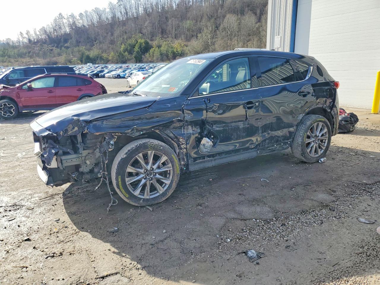 2021 Mazda CX-5 Grand Touring, VIN JM3KFADM3M1355794 — Front end