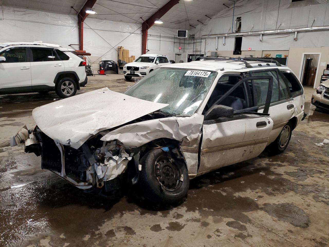 1993 Ford Escort LX, VIN 1FAPP15J2PW359901 — Side