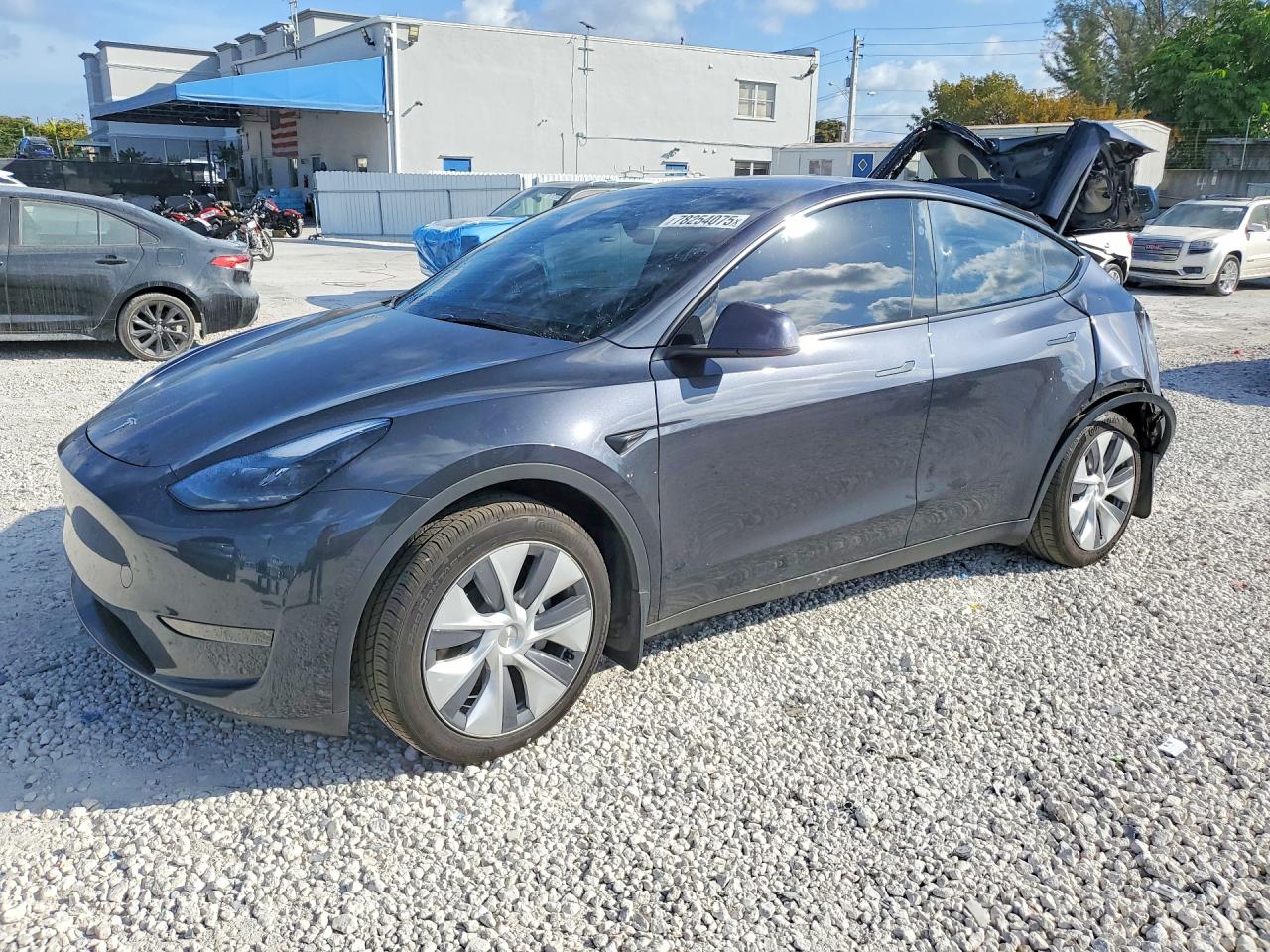 2024 Tesla Model Y, VIN 7SAYGDED4RF092443 — Rear end