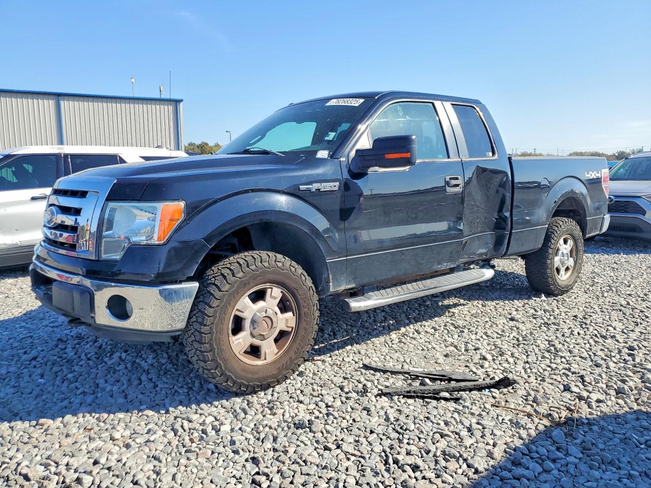 2011 Ford F-150 XLT, VIN 1FTFX1EFXBFD37221 — Minor dents and scratches