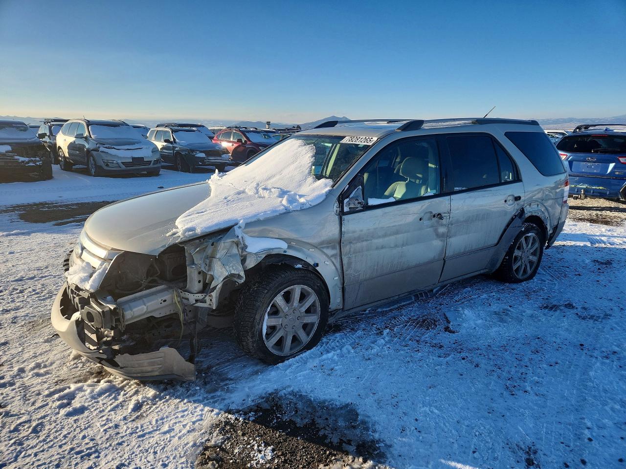 2008 Ford Taurus X SEL, VIN 1FMDK05W08GA04282 — Side