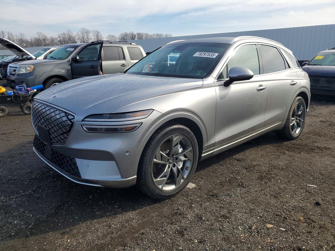 2023 Genesis GV70 Advanced, VIN 5NMMCET12PH000862 — Side