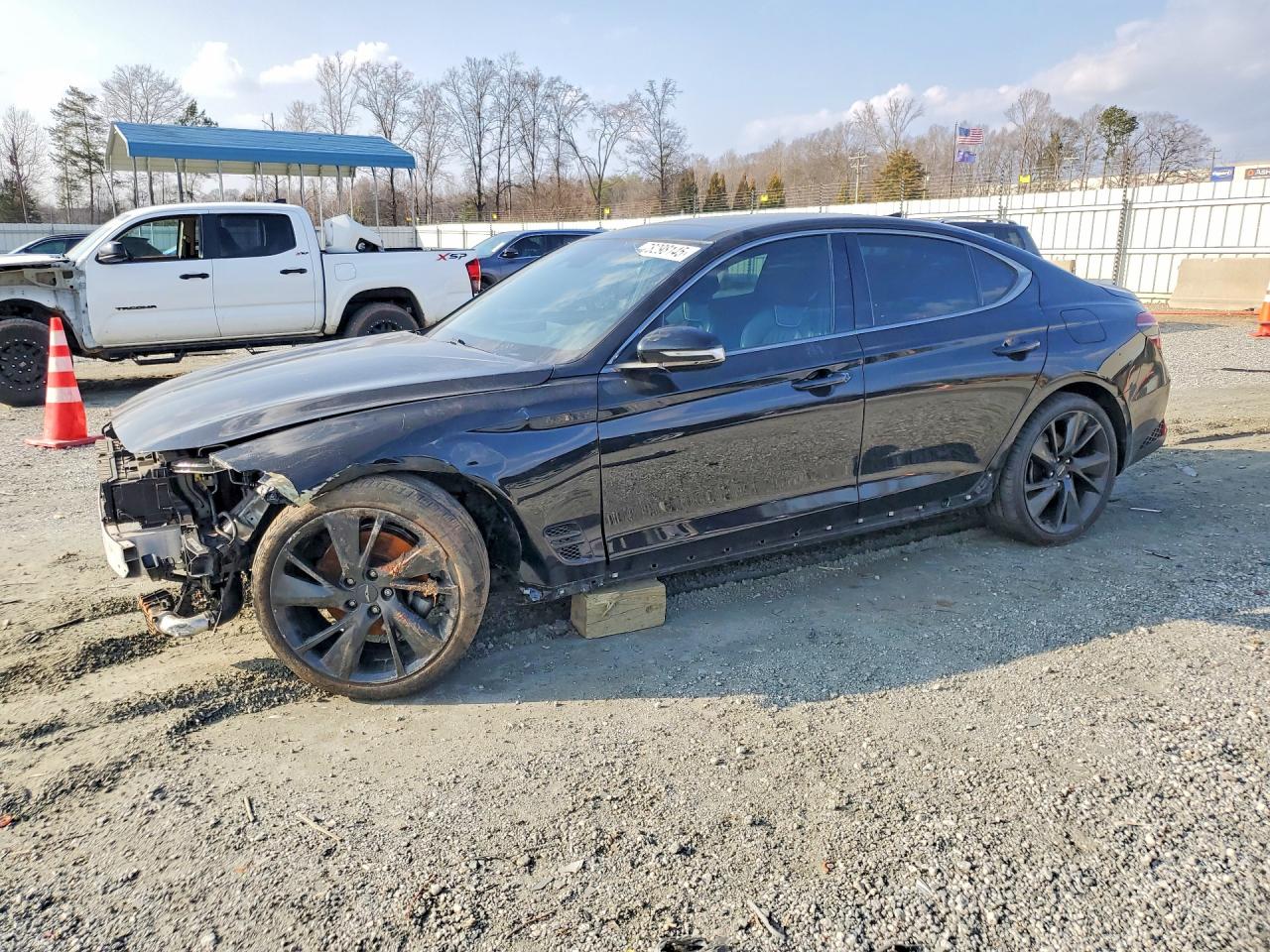 2023 Genesis G70 2.0T, VIN KMTG34TA6PU106782 — Front end