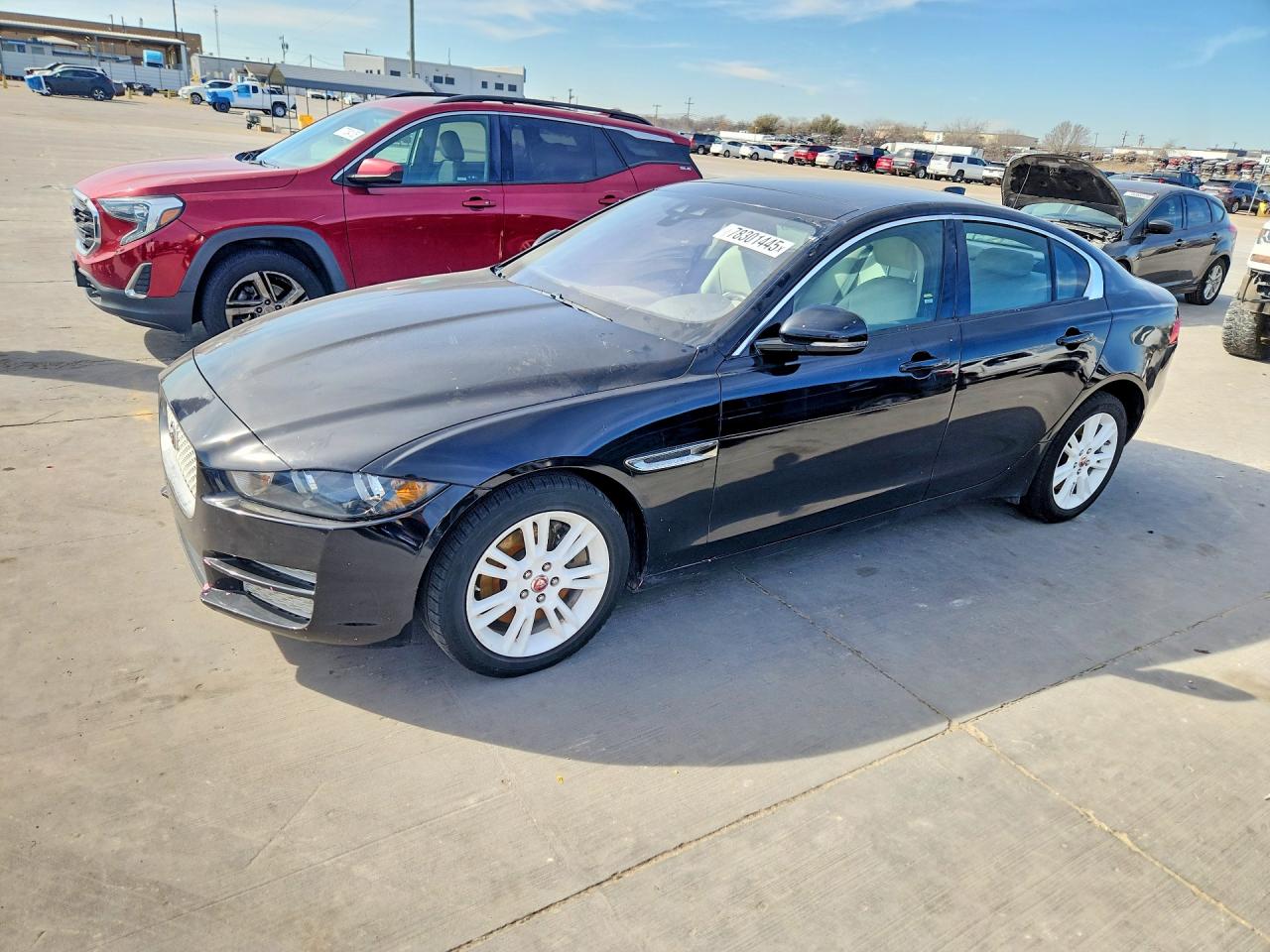 2018 Jaguar XE 25t Premium, VIN SAJAD4FX4JCP41497 — Side