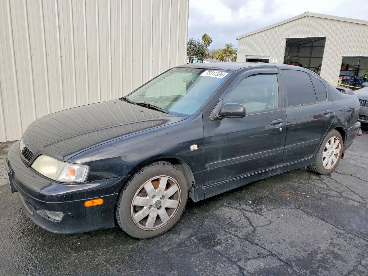 2002 Infiniti G20 Luxury, VIN JNKCP11A22T506175 — Rear end