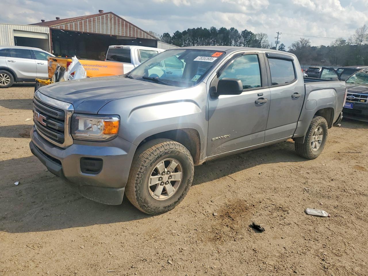 2018 GMC Canyon 2WD, VIN 1GTG5BEA5J1109031 — Side