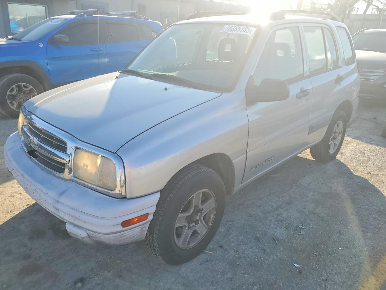 2004 Chevrolet Tracker, VIN 2CNBJ134346911409 — Side