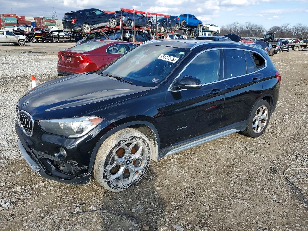 2018 BMW X1 xDrive28i, VIN WBXHT3Z39J4A65924 — Side
