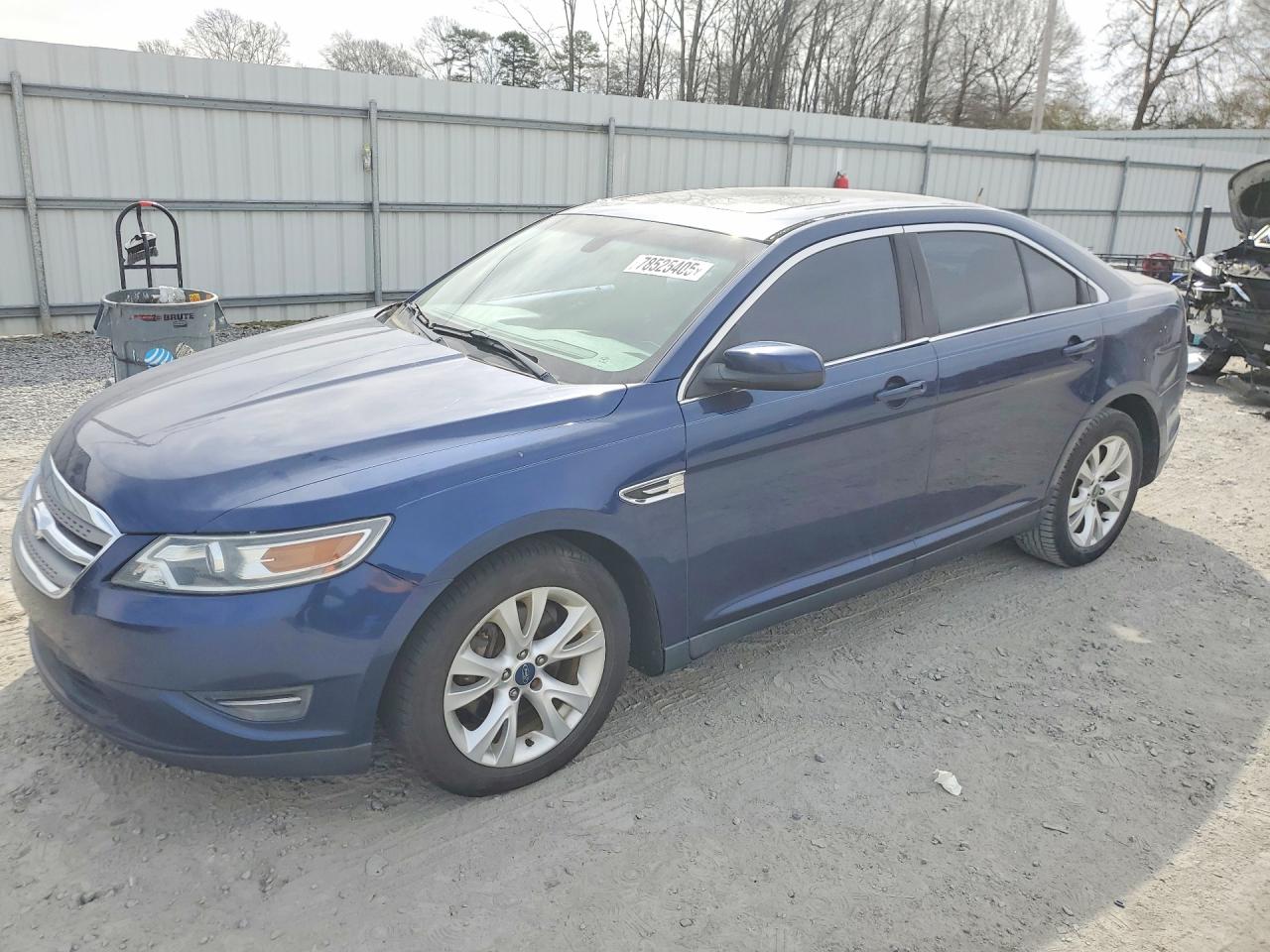 2012 Ford Taurus SEL, VIN 1FAHP2EW6CG123407 — Side