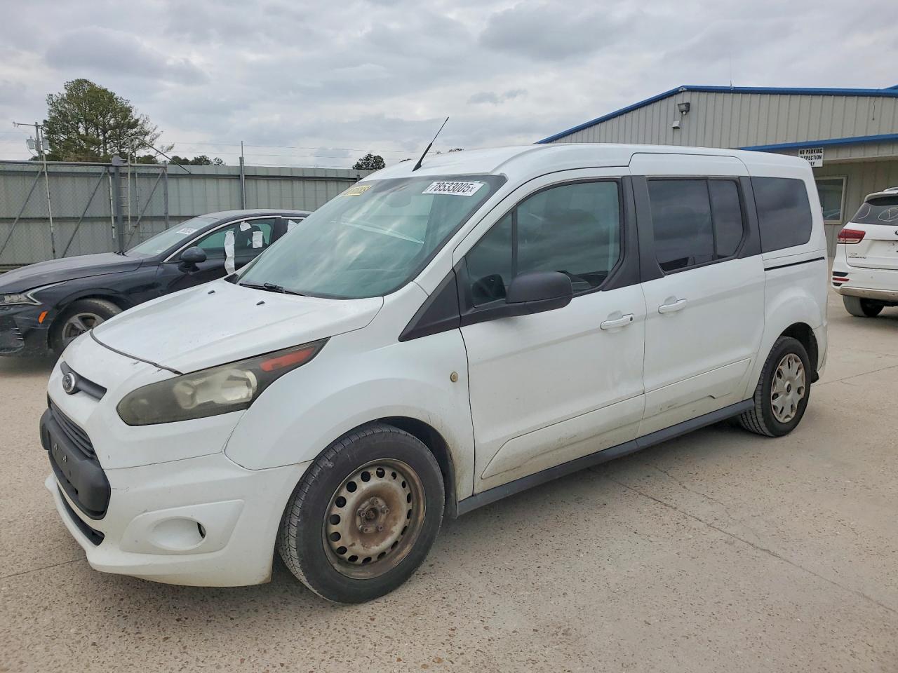 2014 Ford Transit Connect XLT, VIN NM0GS9F70E1163618 — Normal wear