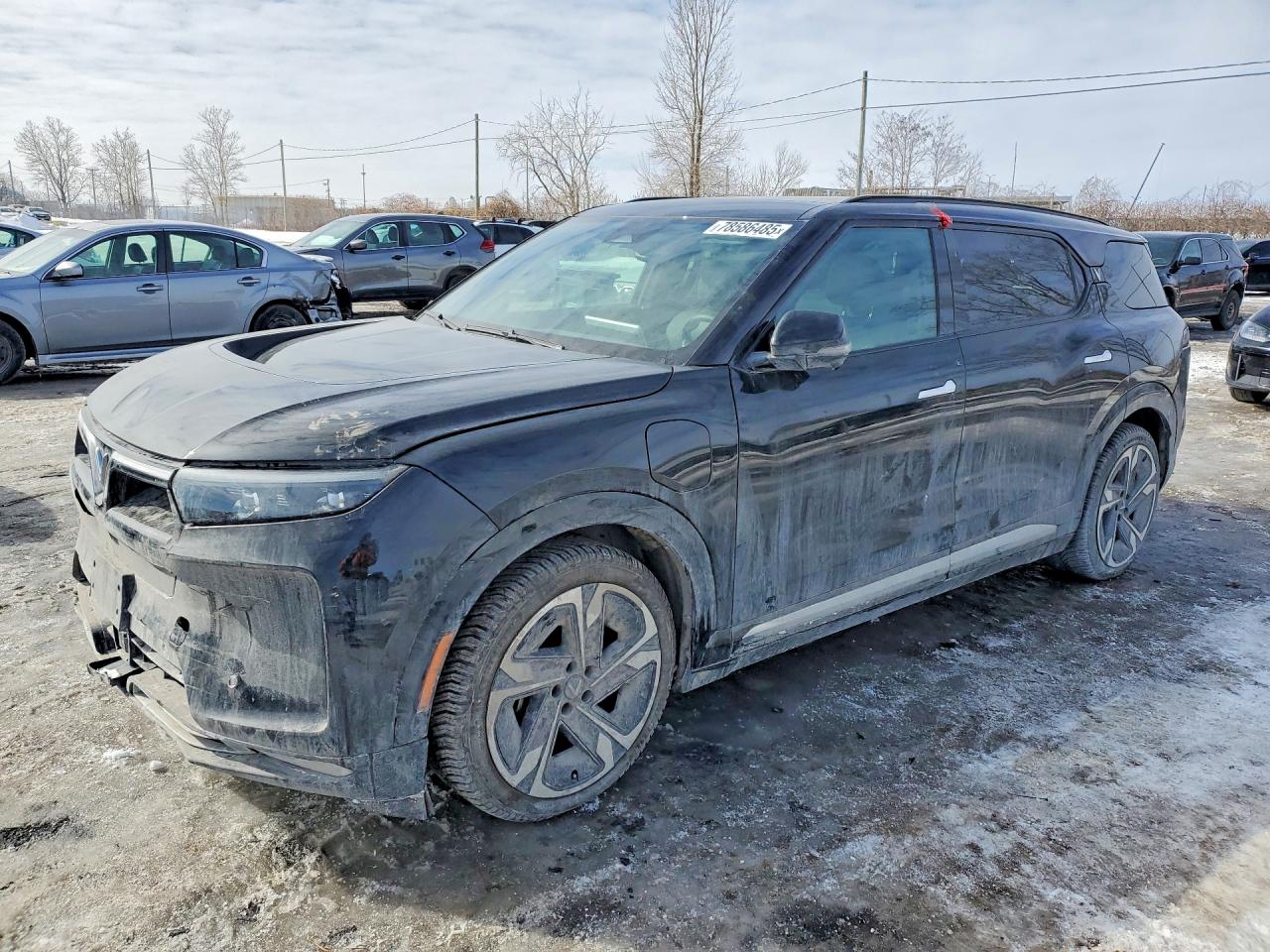 2024 VinFast VF 9, VIN RLLV2CJA4RH000810 — Rear end