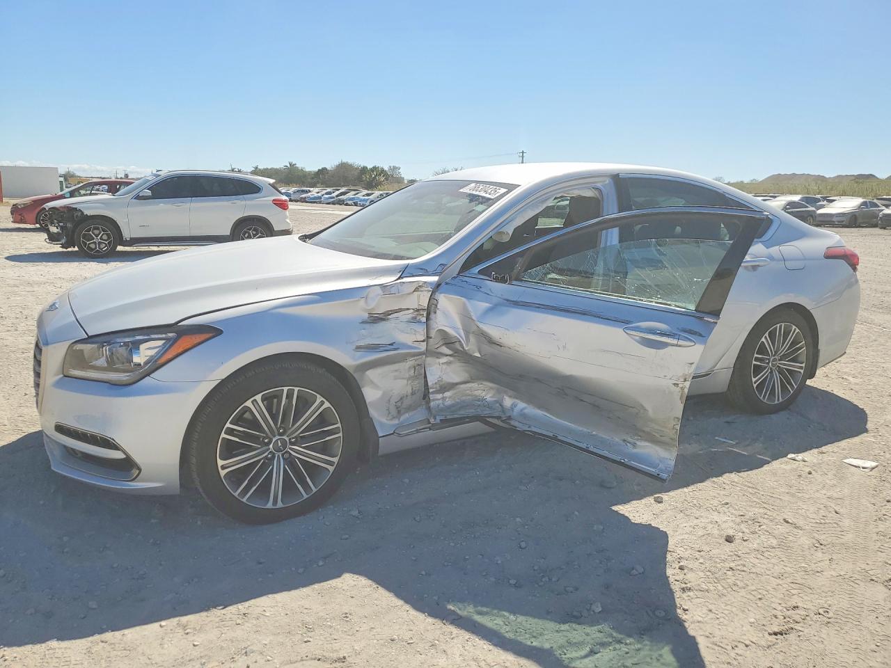 2019 Genesis G80 3.8L, VIN KMHGN4JE9KU299500 — Side